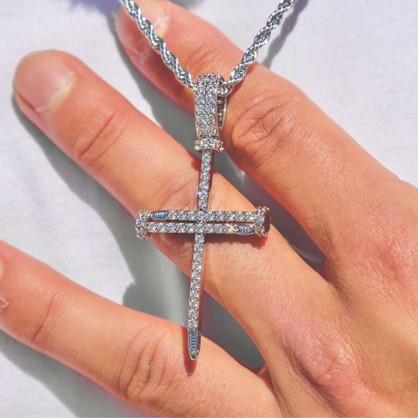 nail-cross-pendant